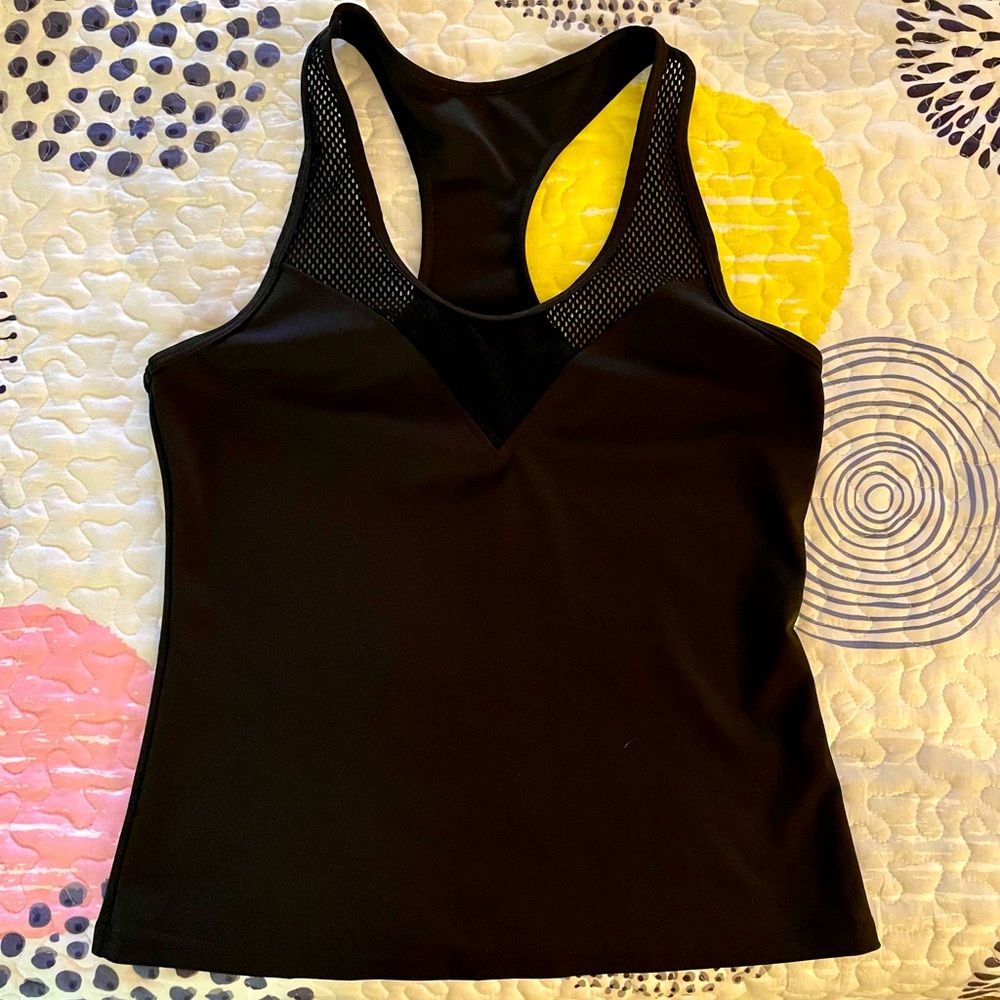 Black workout top with racer-back + mesh detail